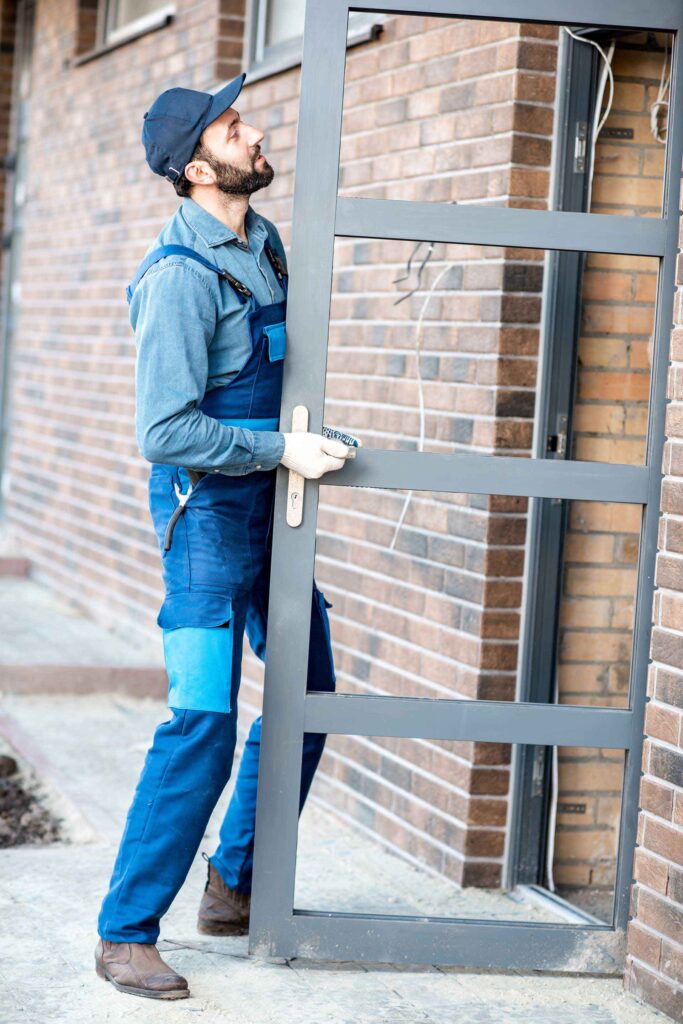 workman-installing-entrance-door